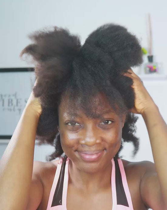 Load and play video in Gallery viewer, Our gorgeous model uses all the wholesome products in the All Your Hair Needs Bundle on her thick beautiful hair. She then styles it in a low bun and front-facing single twists framing the side of her face. Beautiful result.
